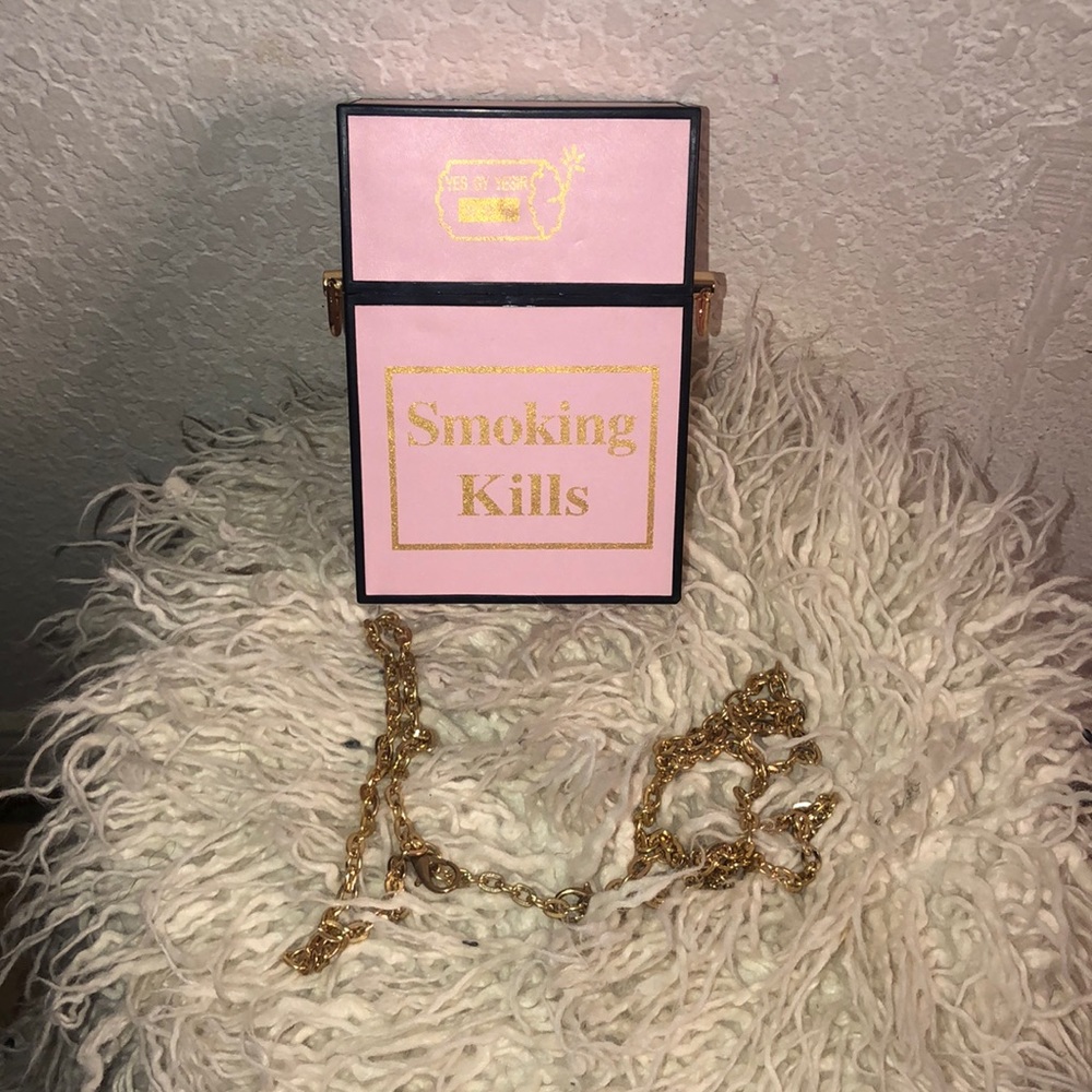 Pink cigarette smoke clutch